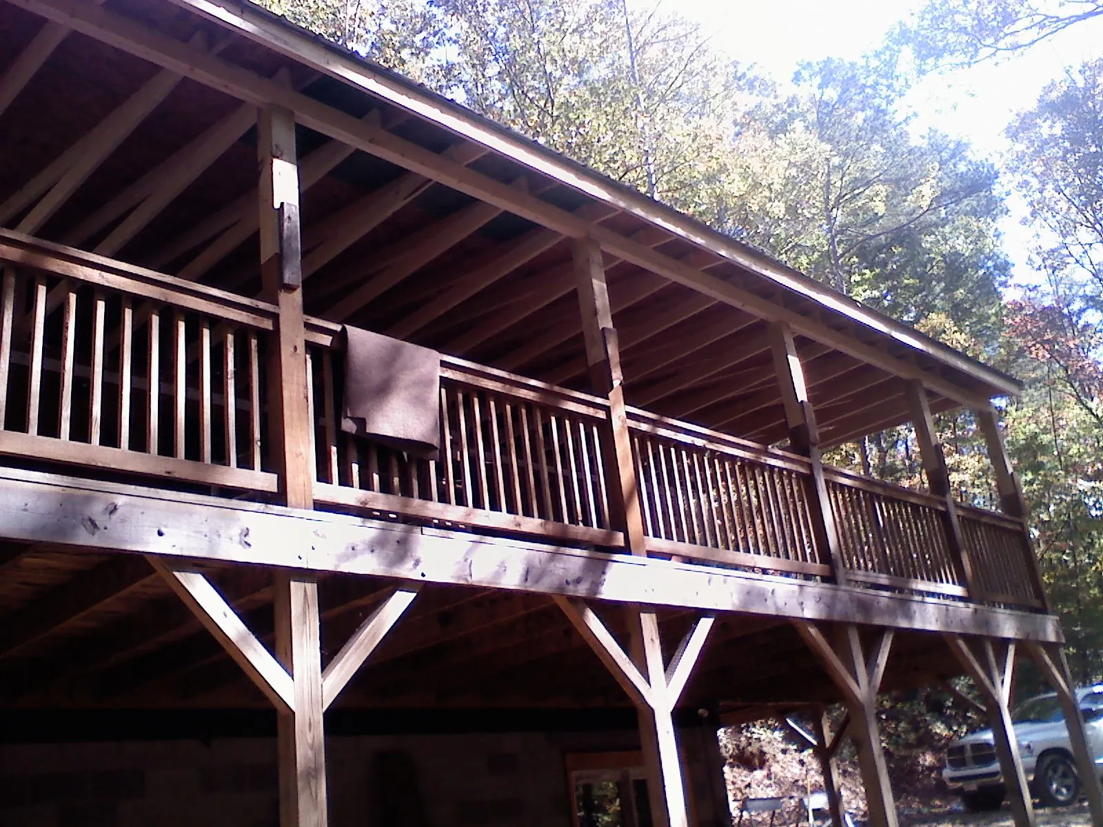 Timber framing under a new elevated porch and deck — Roof Leak Repair in Niota by Roofing Brothers